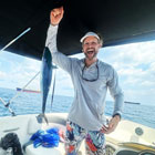 Traveler on fishing trip off Fort Lauderdale Beach