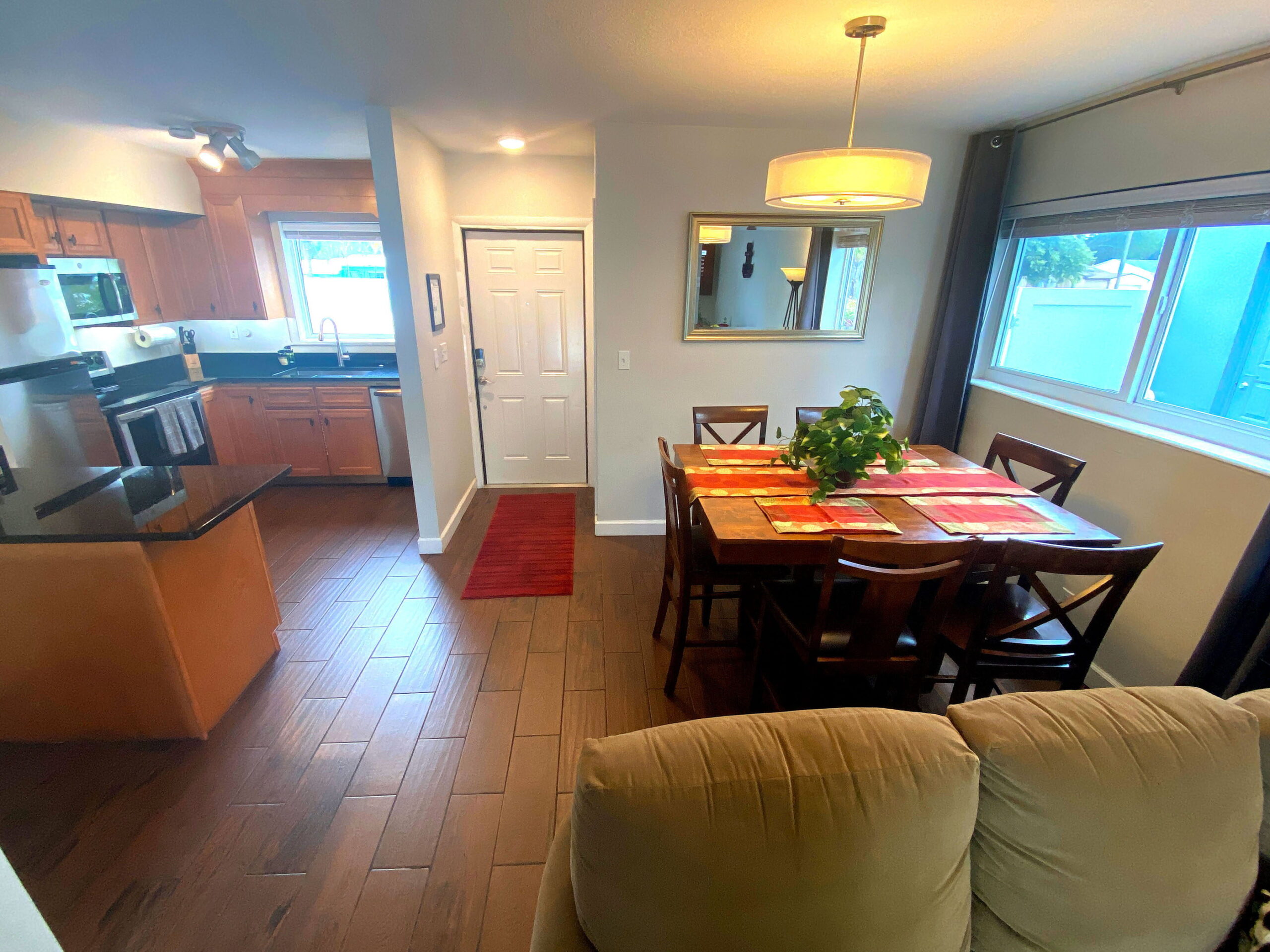 Dining area with seating for six at Tarpon Harbor 1 vacation rental