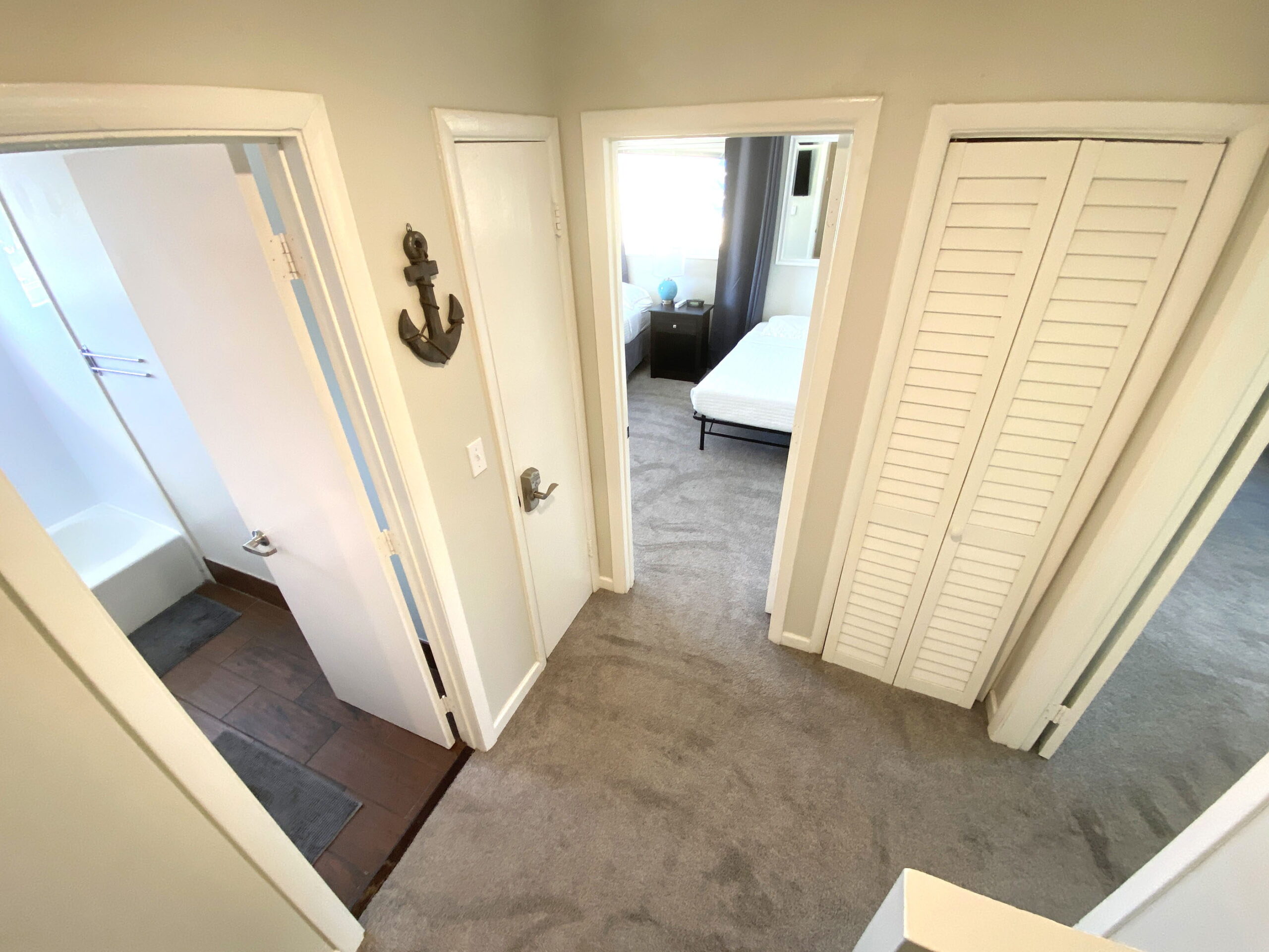 Upstairs hallway connecting the bedrooms at Tarpon Harbor 1 vacation rental